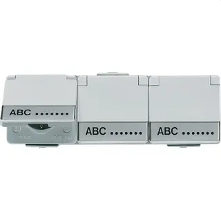 Jung SCHUKO®-Dreifach-Steckdose, 16 A 250 V ~, mit Schriftfeld, Klappdeckel, waagerecht, IP 44, WG 600 623NAW
